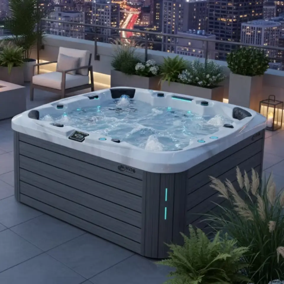 Image of a rooftop patio with a spa, seating and a city skyline in the distance